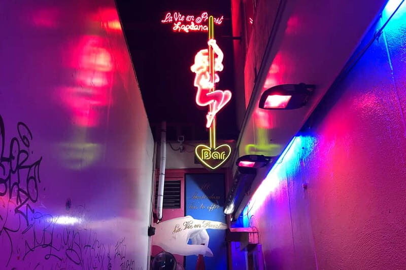 Amsterdam: 1,5-Hour Red Light District Tour - Beursplein to Dam Square: how the guide sets the context fast