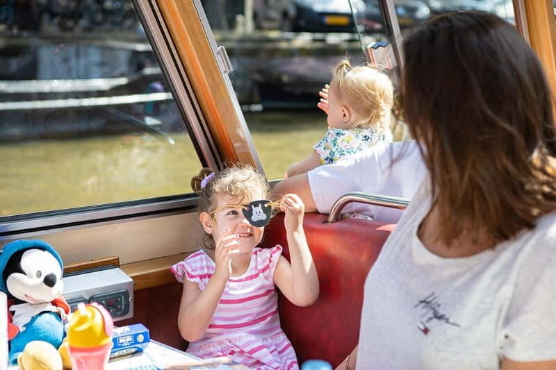 Amsterdam: 75 Minute City Canal Cruise with Audio Guide - Amstel River and Magere Brug: The Postcard Moment at Water Level