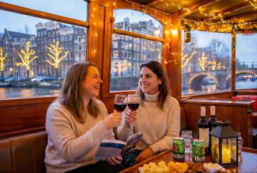 Amsterdam: 90 min Cruise with Local Guide & Unlimited Drinks - Finding the Pink Boat at Museumbrug and Stationsplein