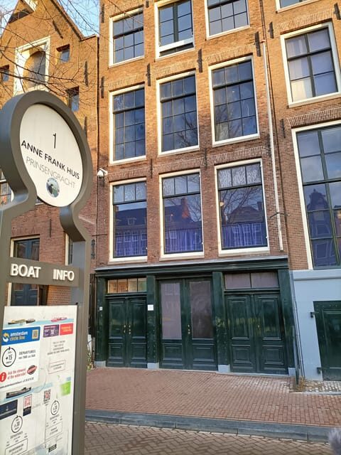 Amsterdam: Anne Frank Guided Small Group Walking Tour - Nieuwezijds Voorburgwal 120: walking through the Jewish history of a neighborhood