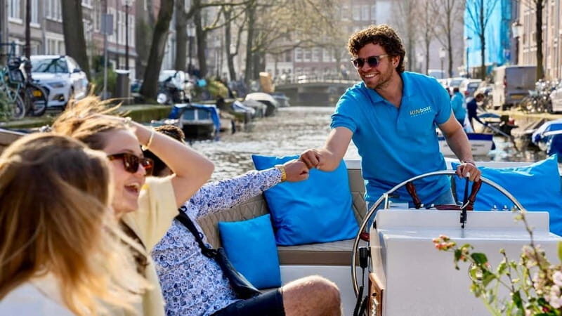 Amsterdam: Canal Cruise in Open Boat with Drink Option - Comfort, weather, and the drink option (what to plan for)