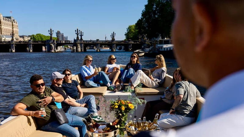Amsterdam: Canal Cruise in Open Boat with Drink Option - Departure options: Central Station vs Anne Frank House area
