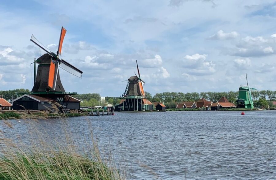 Amsterdam: Countryside Bike Tour and Zaanse Schans Windmills - Clogs and Gouda: the craft stops that turn learning into taste