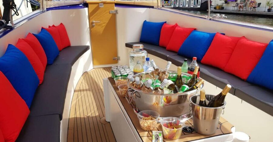 Amsterdam: Covered Canal Booze Cruise with Unlimited Drinks - A one-hour cruise that feels like a local night out