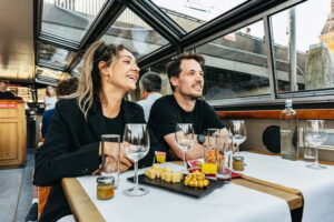 Amsterdam: Cozy Cheese & Wine Cruise Tasting Experience - Getting on board at Damrak Pier 5 without stress