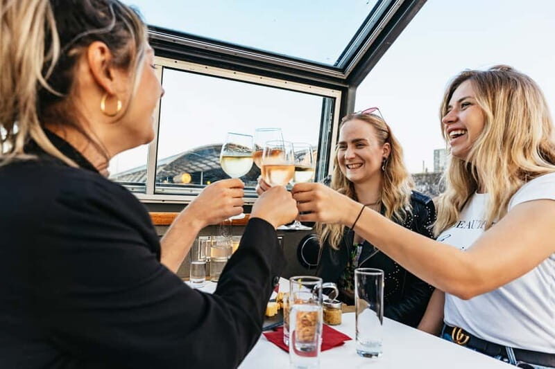Amsterdam: Cozy Cheese & Wine Cruise Tasting Experience - The cheese, nuts, and drinks setup: what’s actually included