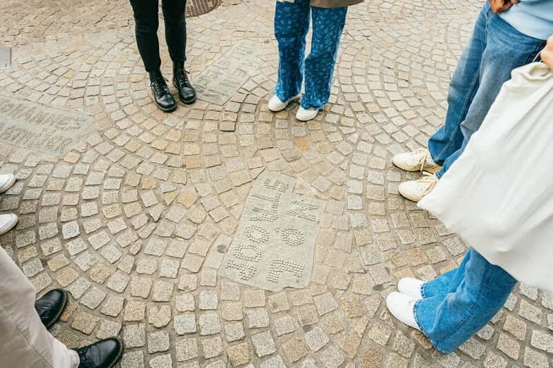 Amsterdam: Cultural Highlights Walking Tour - Torensluis Bridge and the Multatuli statue: colonial-era context without the lecture voice