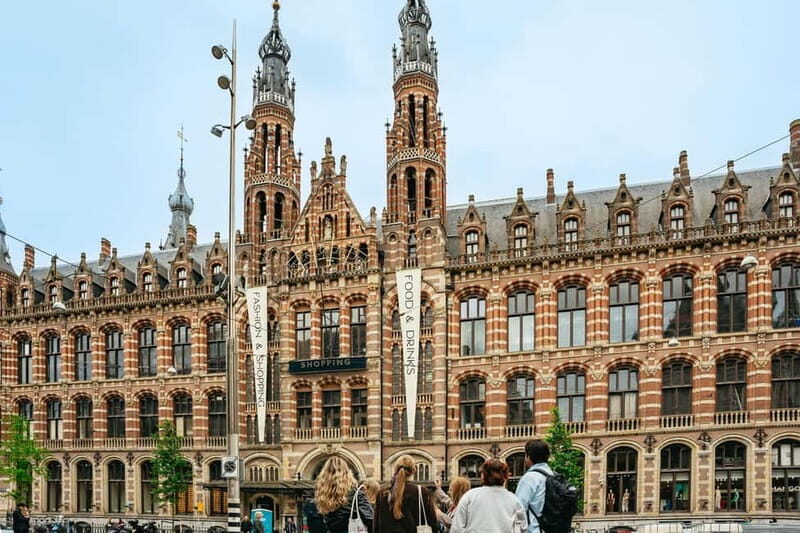 Amsterdam: Cultural Highlights Walking Tour - Dam Square and the Royal Palace area: where the city starts acting important