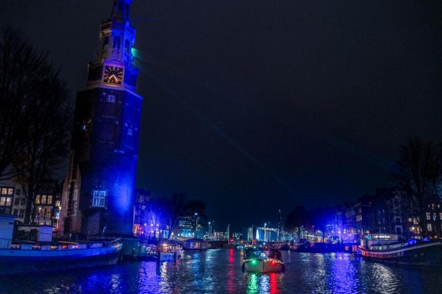 Amsterdam: Evening Candle Light Cruise With Wine & Cheese - Covered boat comfort: rain plans, blankets, and what to wear