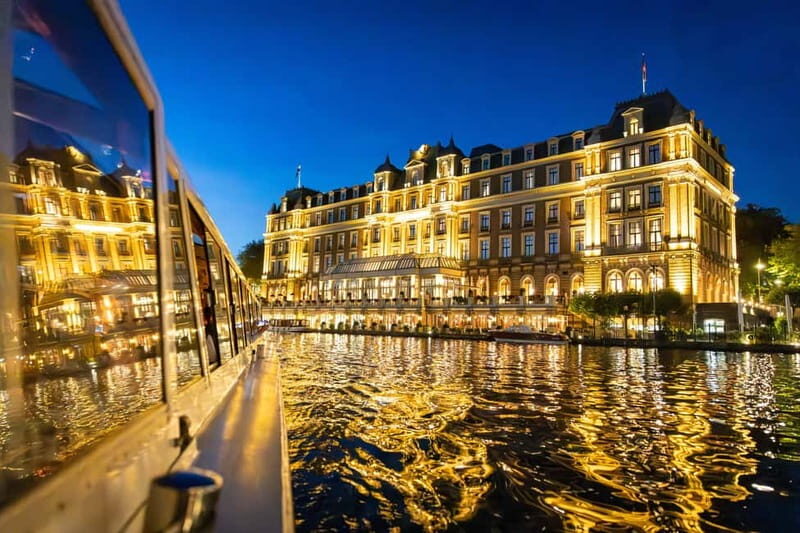 Amsterdam: Evening Cruise with Optional Wine and Snacks - From the canal-house glow to the 17th-century warehouse glide