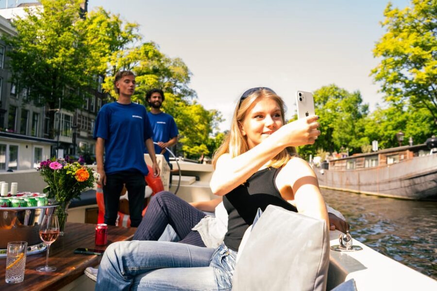 Amsterdam: German Guided Canal Cruise with on Board Bar - Stop-by-Stop: The Landmarks You Glide Past (and What to Watch For)