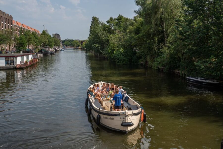 Amsterdam: German Guided Canal Cruise with on Board Bar - Potential Hiccups: Language Changes and Boarding Reality