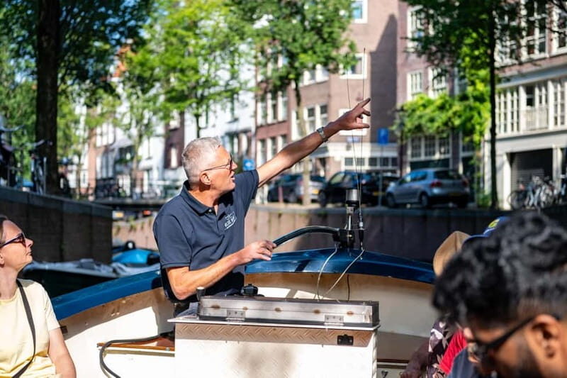 Amsterdam: Guided City Highlights Open Boat Canal Cruise - Quick take