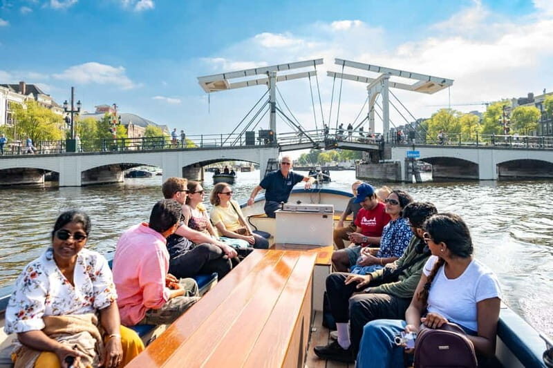 Amsterdam: Guided City Highlights Open Boat Canal Cruise - What makes the open-boat Amsterdam highlight cruise different