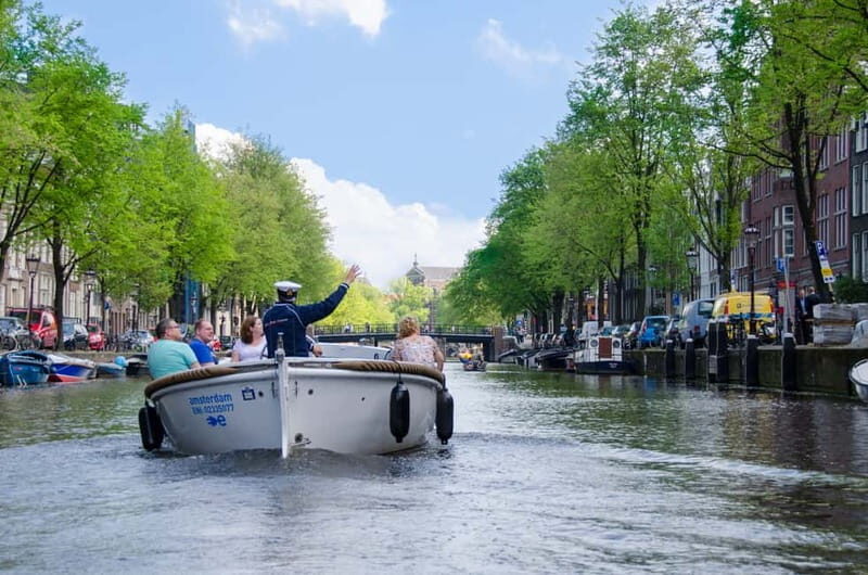 Amsterdam: Guided City Highlights Open Boat Canal Cruise - Your route in order: from Hard Rock Cafe to Magere Brug