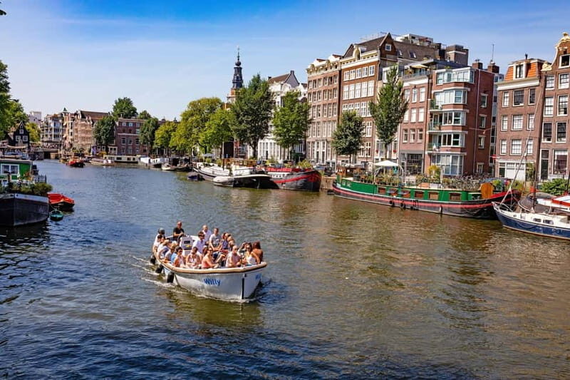 Amsterdam: Guided City Highlights Open Boat Canal Cruise - Photo stops and the captain’s live narration