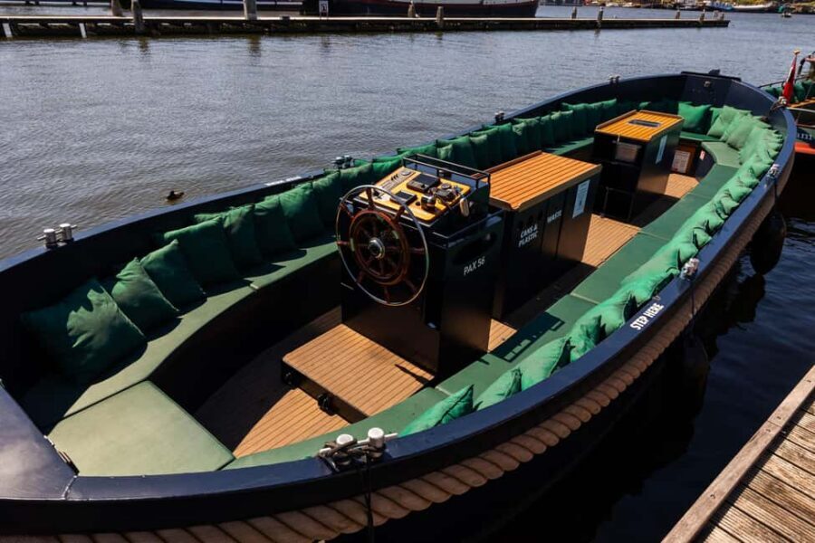 Amsterdam: Guided Open Boat Cruise Unlimited Drinks Option - Weather strategy for an open-air ride