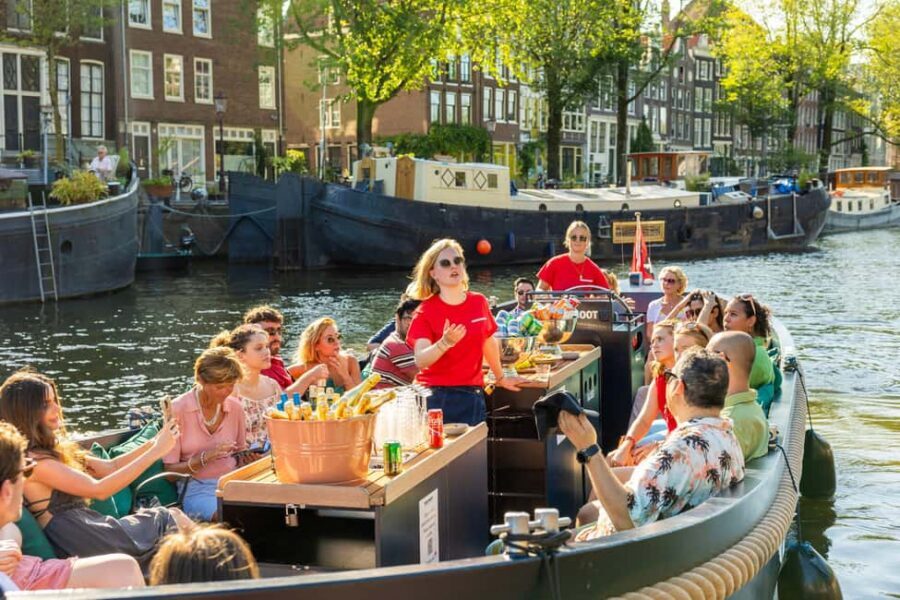 Amsterdam: Guided Open Boat Cruise Unlimited Drinks Option - Stop-by-stop: what you’ll see during the photo moments