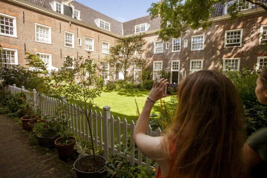 Amsterdam: Hidden Gems & Highlights Guided Bike Tour - Jordaan District: Courtyards, Churches, and Canal-Ring Views