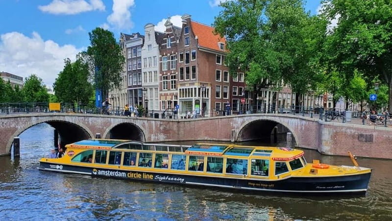 Amsterdam: Historic City Centre Canal Cruise - What comfort feels like on a heated canal boat (and when the roof opens)