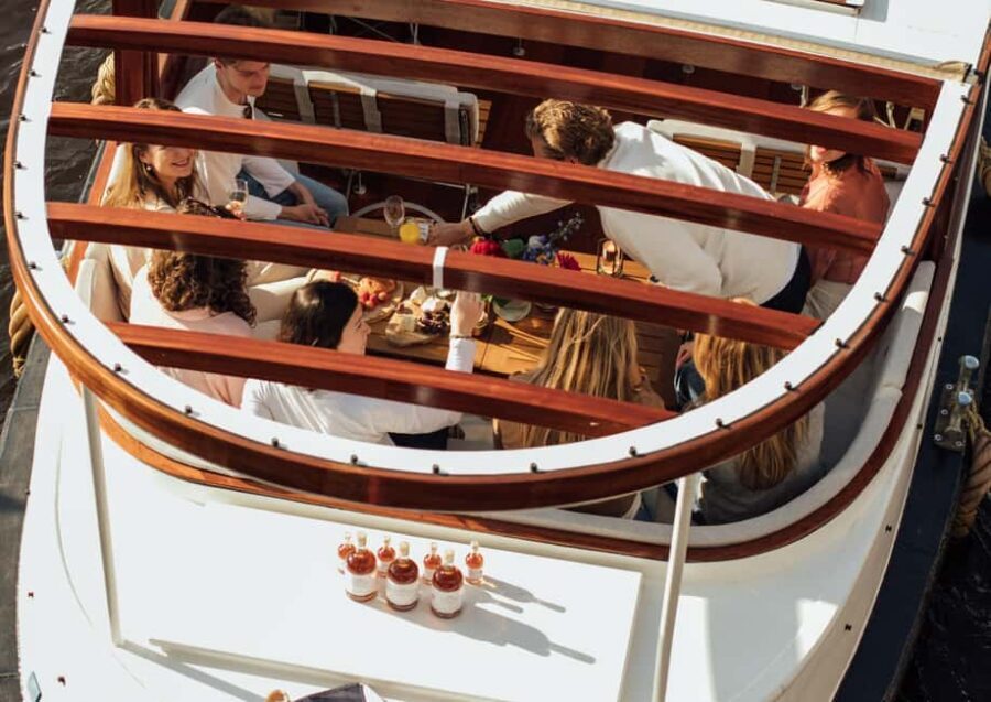 Amsterdam: Luxury Saloon Boat Cruise with Cocktails & Waffle - Friendship in a Storm plus the Dutch waffle: your first 15 minutes matter