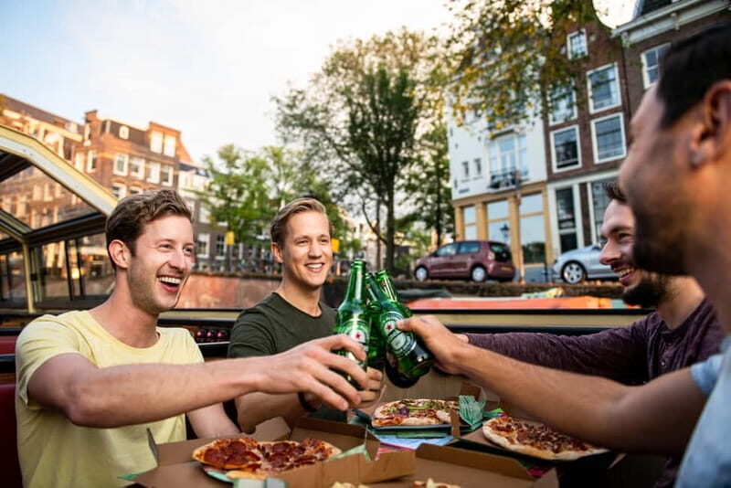 Amsterdam: Original Pizza Dinner Cruise + Unlimited Drinks - Route highlights: from Damrak to the Canal Belt landmarks