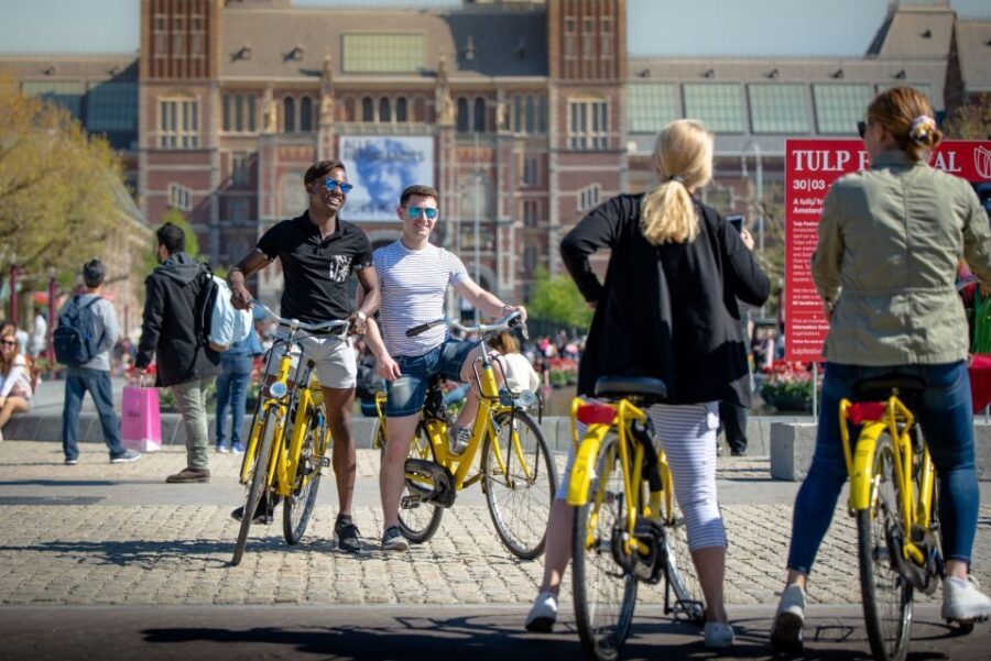 Amsterdam: Relaxed City Highlights Guided Bike Tour - Nieuwezijds Kolk 29: Starting in Amsterdam’s Heartbeat