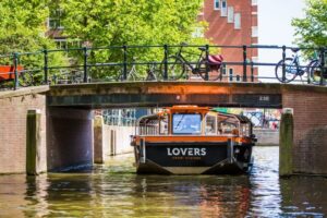 Amsterdam: Semi-Open Canal Boat Cruise - Your 1-hour route: what you’ll likely spot from the canal