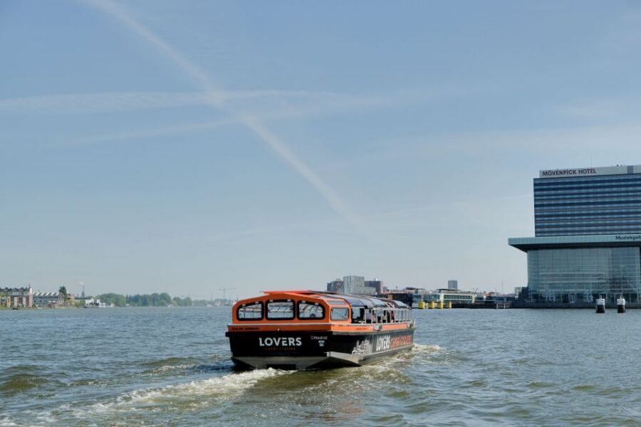 Amsterdam: Semi-Open Canal Boat Cruise - Semi-open roof and rainy-day reality: what actually happens