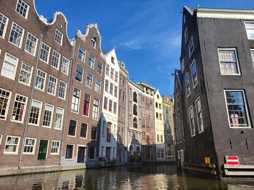 Amsterdam: Small-Group Canal Cruise incl. Drinks and Snacks - The Amstel River and Magere Brug: The Bridge Moment Everyone Talks About
