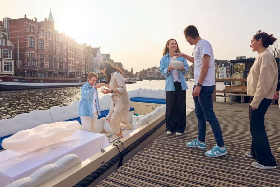 Amsterdam: Smoke & Cruise on covered Cannabis Boat With Bar - The one-hour route: from Red Light District to Seven Bridges