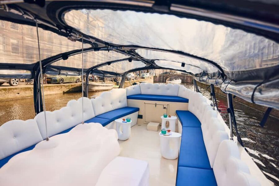 Amsterdam: Smoke & Cruise on covered Cannabis Boat With Bar - The onboard bar, blankets, and winter comfort
