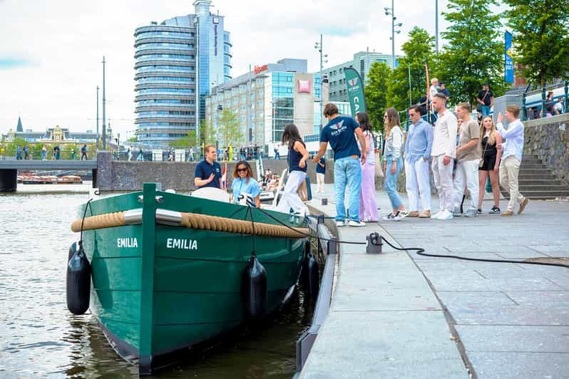 Amsterdam: The Newest Canal Cruise with Drink Option - Electric-boat comfort: open-air views or a sheltered ride