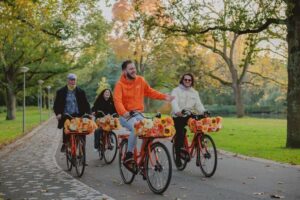 Amsterdam: Top Highlights Guided Bike Tour - Meeting near Central Station: finding the bright orange bikes fast