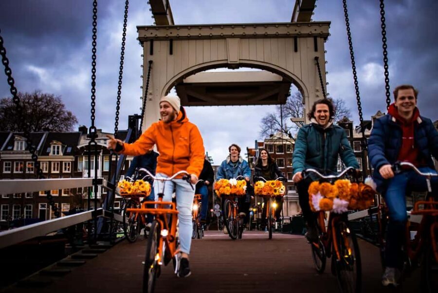 Amsterdam: Top Highlights Guided Bike Tour - Anne Frank House area and Westerkerk: serious moments with clear landmarks