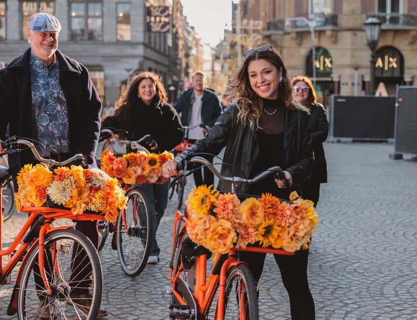 Amsterdam: Top Highlights Guided Bike Tour - Passing through the Red Light District: you’ll see it, but you won’t get stuck there