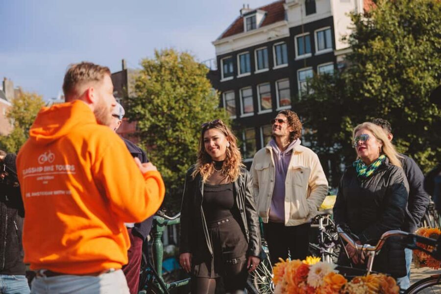 Amsterdam: Top Highlights Guided Bike Tour - Leidse Square street food and a food-market moment