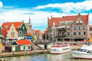 Amsterdam: Zaanse Schans, Edam, Volendam & Marken Bus Tour - Meeting point and coach ride: where the day starts