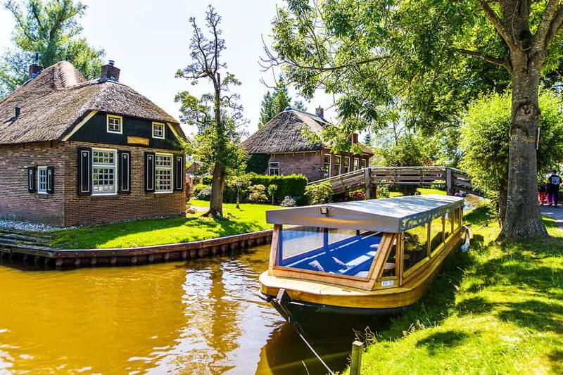 From Amsterdam: Ultimate Giethoorn Experience with Boat Tour - From Central Station to Giethoorn: The Coach Ride That Sets the Tone