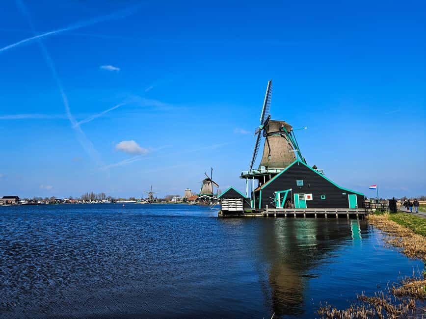 From Amsterdam: Volendam and Zaanse Schans Tour with Cheese - Zaanse Schans: Clogs, Cheese, and Working Windmills